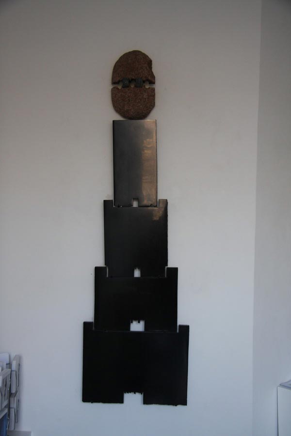 Self portrait - Ton Le fare breton, 2011, black marble, granite, 60 x 4 x 180 cm.