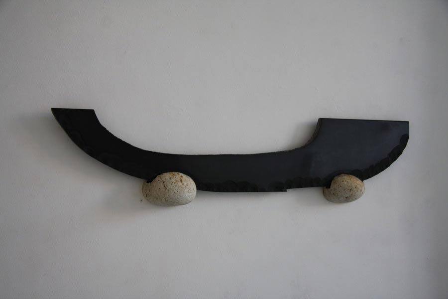 Voor Pampus, 2011, black marble, granite, 120 x 11 x 30 cm.