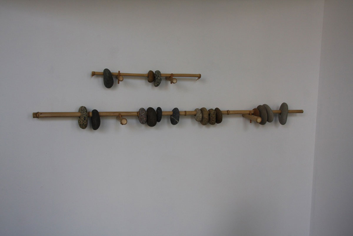 Counting of the Hunt, granite, bamboo, 140 x 17 x 25 cm